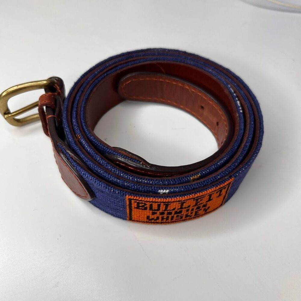 This item is a Smathers & Branson hand-stitched needlepoint belt featuring the B